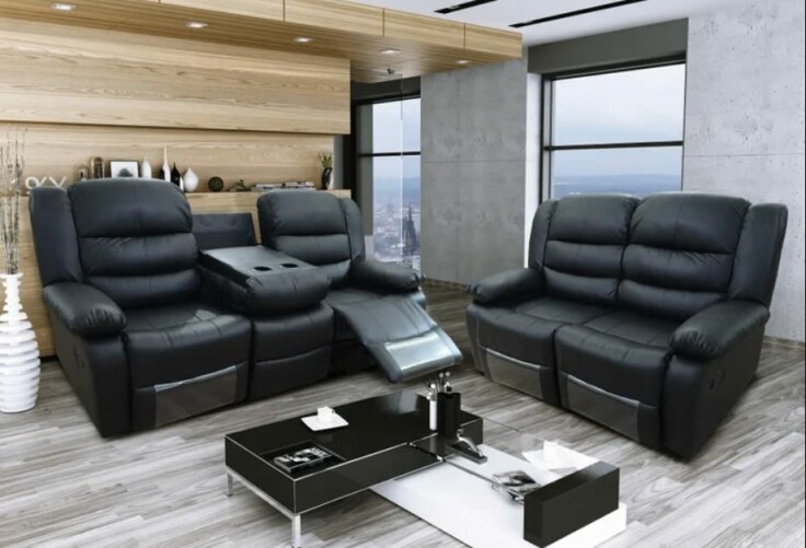 Roma Leather Recliner Sofa with cupholders in a living room.