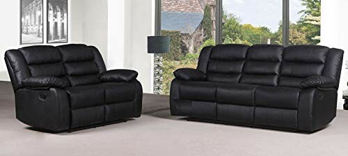 Black leather sofa and loveseat in a living room.