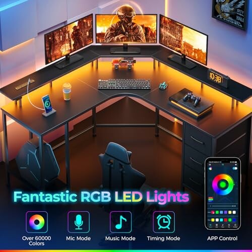 RGB gaming desk setup with LED lights and multiple monitors.