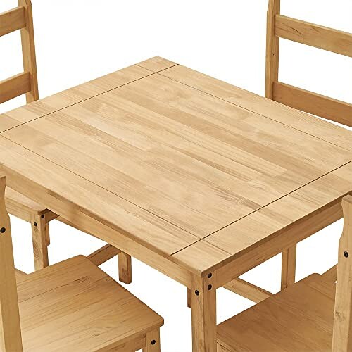 Wooden dining table with chairs.