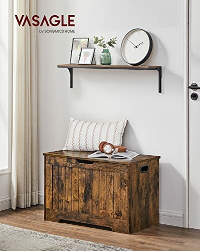 Rustic wooden storage bench under a wall shelf with decor items.